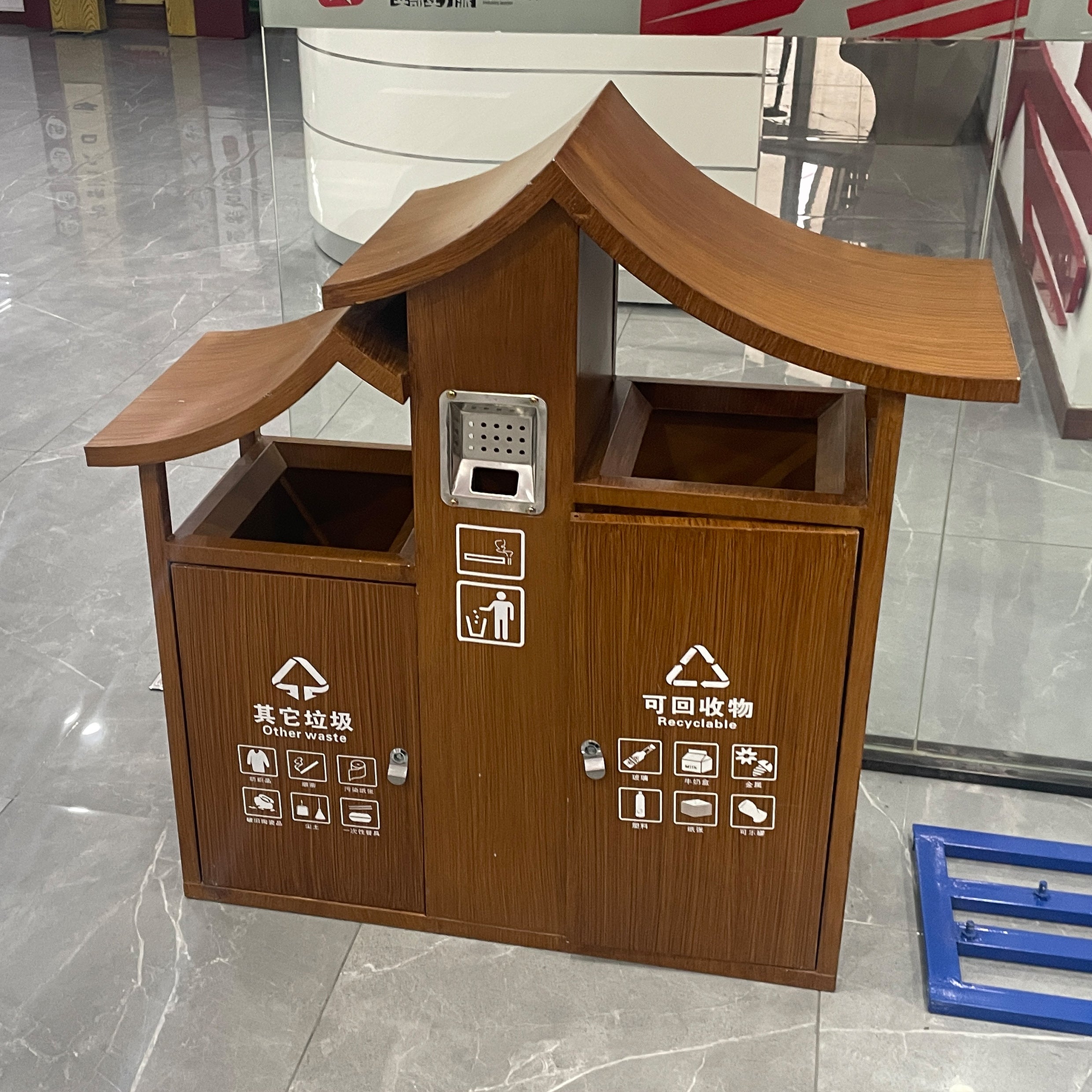Outdoor metal and wood grain trash bin